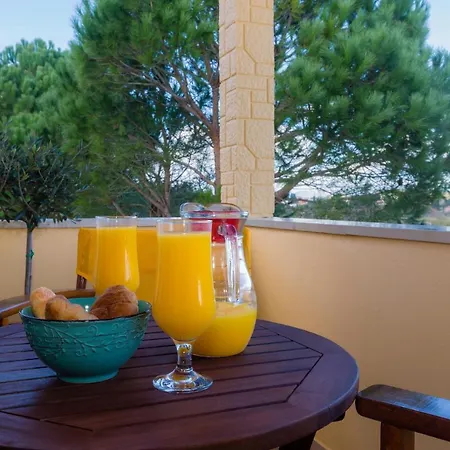 Louisa's Summer House Casa de Férias